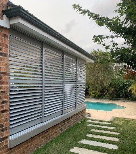 Silver Sliding Shutters