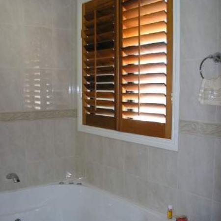 No matter what shape the window ShutterKits can create a cosy backdrop to any situation. Julie and Roy's house is totally fitted out with Western Red Cedar Plantation Shutters. Internal Plantation Shutters have been fitted into the windows in the bathroom creating a lovely feature and creating the privacy you need for any room. 