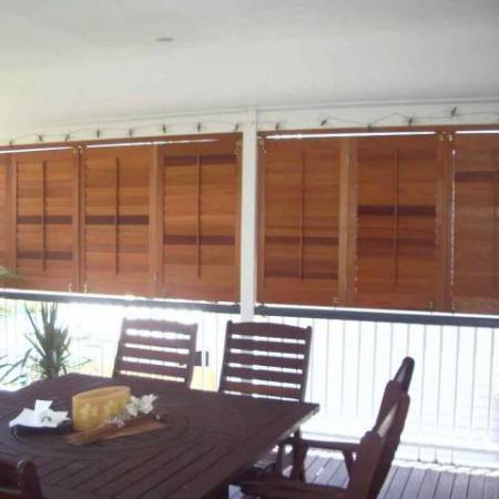 Andrea's Folding Veranda Shutters are a neat way to open the veranda to the world on warm days when the sun is not low enough in the sky to penetrate the living area. Andrea used a tracking system to install these gorgeous shutters. Using a tracking system to install your Western Red Cedar shutters, allows a smooth running action when used in an ideal bifold situation such as this.