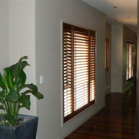 Keeping the natural Western Red Cedar tones in the shutters add's to the attractive timber floor. Shutters versatility is not only for outdoors but indoors too. Renovation of your home is a great way to enhance the privacy and create nice feature windows. Lucas's veranda before and after is only one part of the transformation to the house which has used plantation shutters extensively throughout; the shutters in the house compliment the timber floor fantasticly!