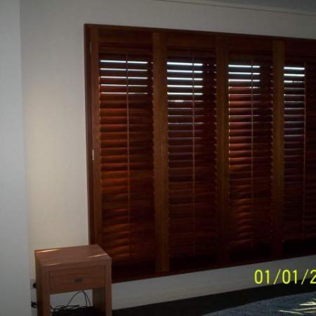 Living room shutters made out of Cedar give a warm and rich feeling to the room. Western Red Cedar can soften the feeling of any room in any house. Sliding Bi-fold Western Red Cedar shutters are designed so you have control of the light and air flow in your home; perfect for brightening up the room or making the perfect home theatre.