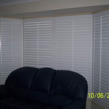 Even though painting shutters is labour intensive these examples of client painted shutters are very effective.
