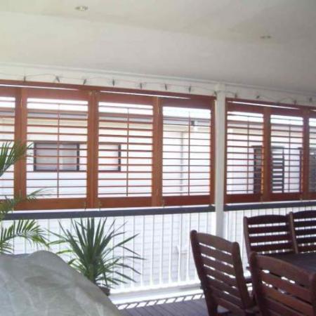 Andrea's Folding Bi-fold Veranda Shutters are a neat way to open the veranda to the world on warm days when the sun is not low enough in the sky to penetrate the living area. Andrea used a tracking system to install these gorgeous shutters. Using a tracking system to install your Western Red Cedar shutters, allows a smooth running action when used in an ideal bifold situation such as this.