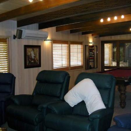 Roger's Home Theatre and games room has added aesthetic beauty as well as a way to watch a good movie without the sun intruding. Shutting out sunshine and heat from a t.v. and games room is what timber plantation shutters do well.