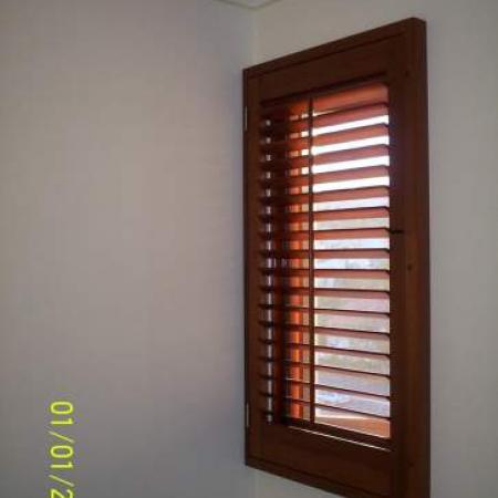 Lisa also used the same concept in the dining room. Western Red Cedar can soften the feeling of any room in any house. Sliding Bi-fold Western Red Cedar shutters are designed so you have control of the light and air flow in your home; perfect for brightening up the room or dimming the room when needed.