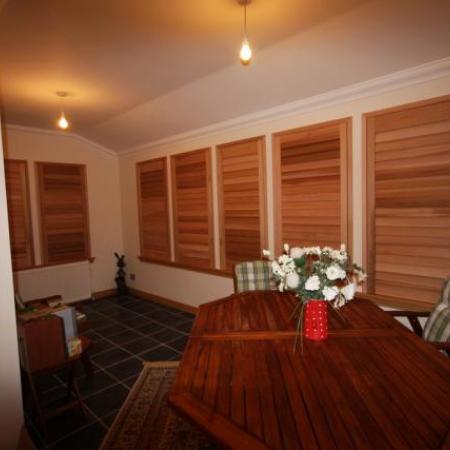 Western Red Cedar Shutters are made of rich natural oiled Cedar; it warms the room, keeps out the cold in winter and shields the room from the sun in summer. These shutters offer the ultimate in privacy and leave you with a cozy safe feeling.