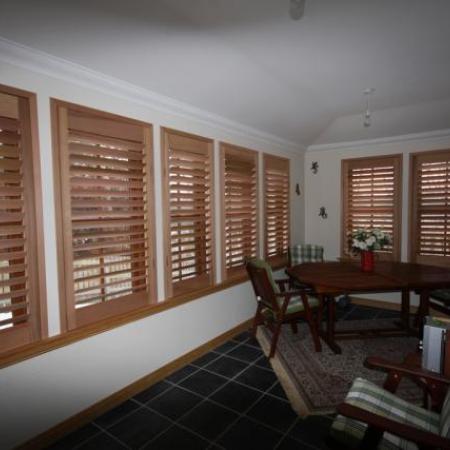 Western Red Cedar Shutters are made of rich natural oiled Cedar; it warms the room, keeps out the cold in winter and shields the room from the sun in summer. These shutters offer the ultimate in privacy and leave you with a cozy safe feeling.