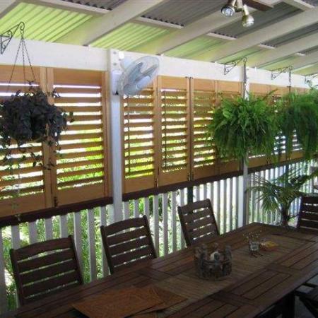 The Western Redd Cedar Plantation Shutters enclose Jakko's classic Queensland veranda, bringing a privacy from the neighbours. They all bi-fold back so that Jakko can open up the area entirely. Jakko has testified, 