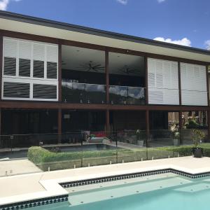 Aluminium External Verandah Shutters hinged in L frame allows you to keep the world out and keep the warmth or cool air in. Adding External Shutters to your verandah grants you the ability to utilise your space; your shutters, your way!